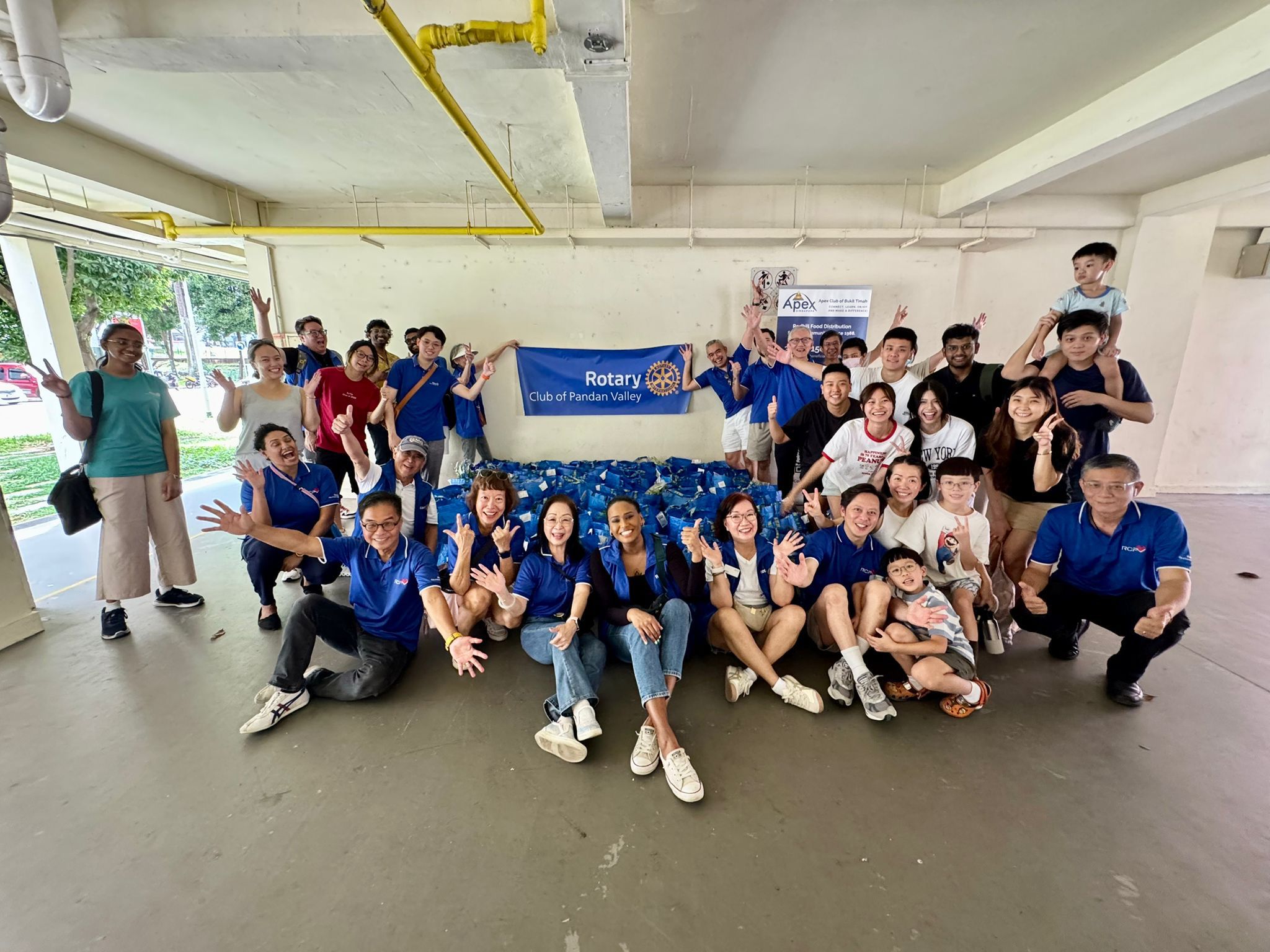Service Above Self: Rotary Club of Pandan Valley Joins the Redhill Food Distribution